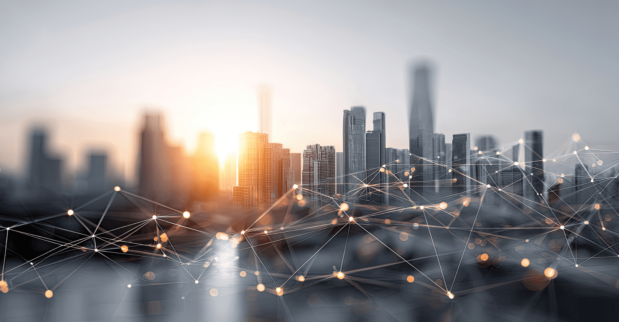 a city skyline at sunrise overlaid with an illuminated network of connected nodes